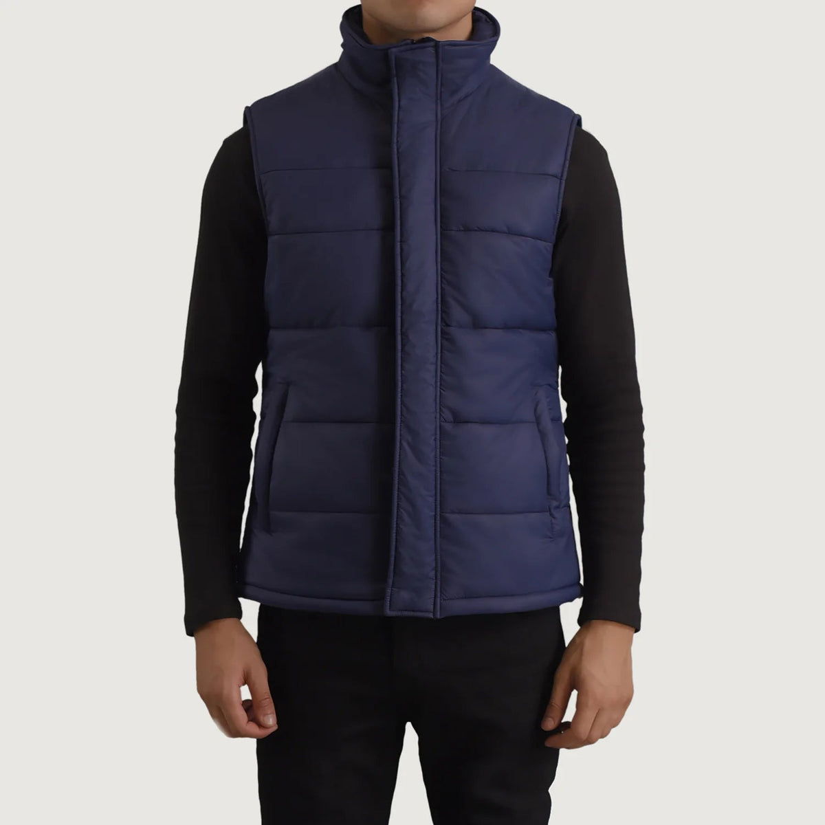 Close-Up Detail of Classic Collar &amp; Zipper With Placket Hardware on Bryan Blue Puffer Vest