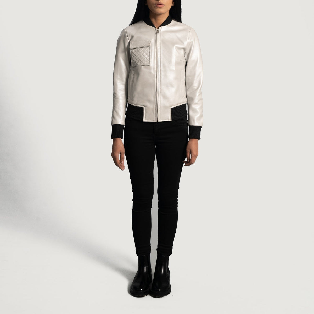 Close-Up Detail of Varsity &amp; Zipper Hardware on Women's Lana Silver Leather Bomber Jacket