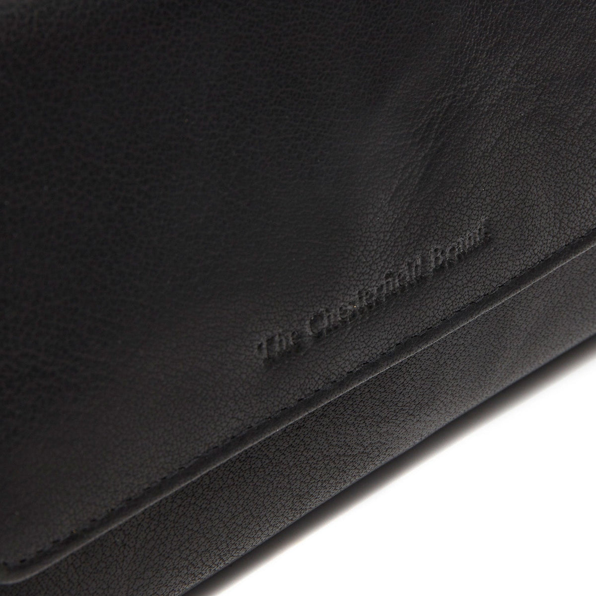 
Solid Antique Brass Hardware & Heavy-Duty Dual Zipper Detail on Rhodos Кожаное портмоне