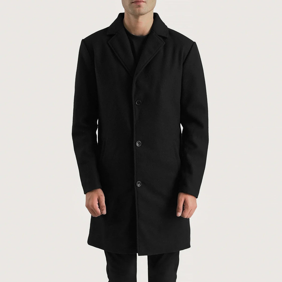 Close-Up Detail of Notch &amp; Button Hardware on Petrillo Black Wool Single Breasted Coat