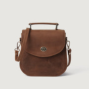 
The Sandra Vintage Рыжий Leather Saddle Bag For Women in Tan Full Grain Naturally Milled Cowhide Leather. - Full Exterior Вид спереди и приталенный силуэт | Купить в официальном онлайн-магазине